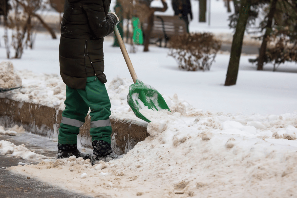 shoveling slush sidewalk