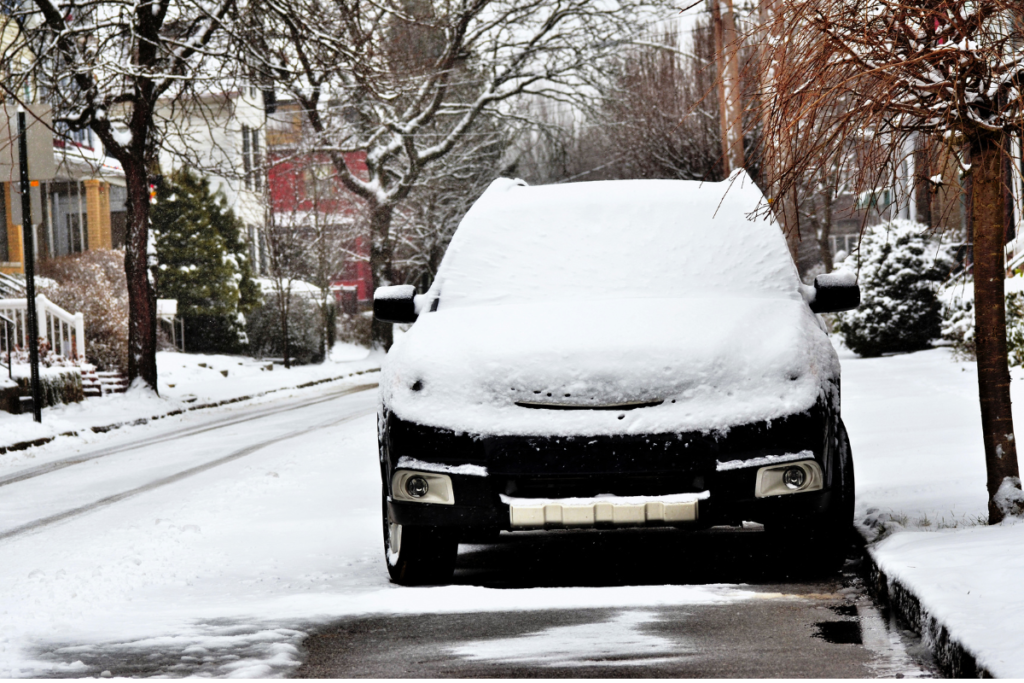 car covered in snow Canada