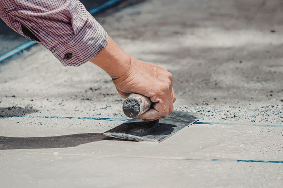 applying seal coat driveway roller asphalt